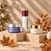 Retinol serum and face creams in an autumn setting